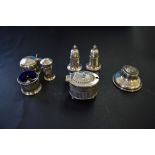 A silver three piece cruet set, by Docker & Burn Ltd,