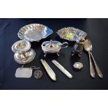 A silver shell butter dish; and other silver items, 225g weighable.