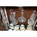 Six various cut glass decanters and stoppers, to include an example by Stephens.
