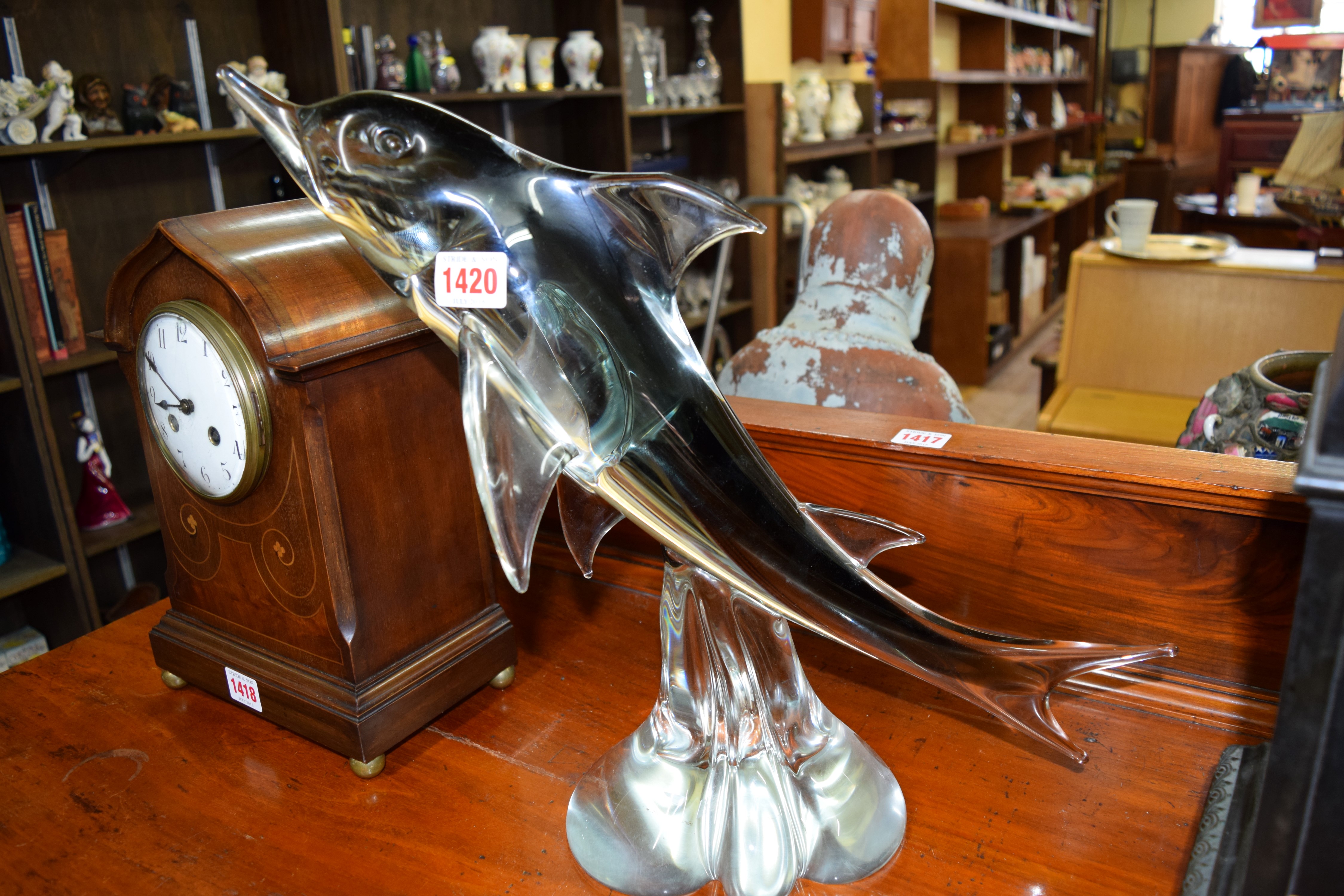 A Murano style clear and smoke glass dolphin, 38cm high.