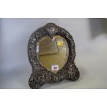 A Victorian silver mounted heart shaped easel dressing mirror, by W Comyns, London 1892,