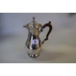 A silver hot water pot, by C.