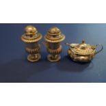 A pair of Continental metal pepperettes; and a silver mustard pot.