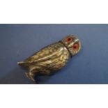 A plated owl pepperette, by R.B & Co, having glass eyes, 9cm.