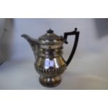 A George III silver hot water or ale jug, by William Bateman I, London 1820,