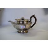 A George III silver teapot, by William Burwash & Richard Sibley, London 1809,