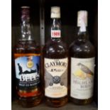 Three 1 litre bottles of blended whisky, comprising: Highland Bird; Bell's; and The Claymore.