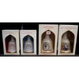 Four commemorative decanters of Bell's blended whisky,