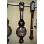 A 19th century mahogany and line inlaid five dial wheel barometer, by Wilson, London.