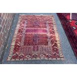 A Persian garden rug having geometric design, 147 x 118cm.