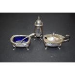 A silver three piece cruet set, by Barker Ellis Silver Co, Birmingham 1966, with one spoon, 112g.