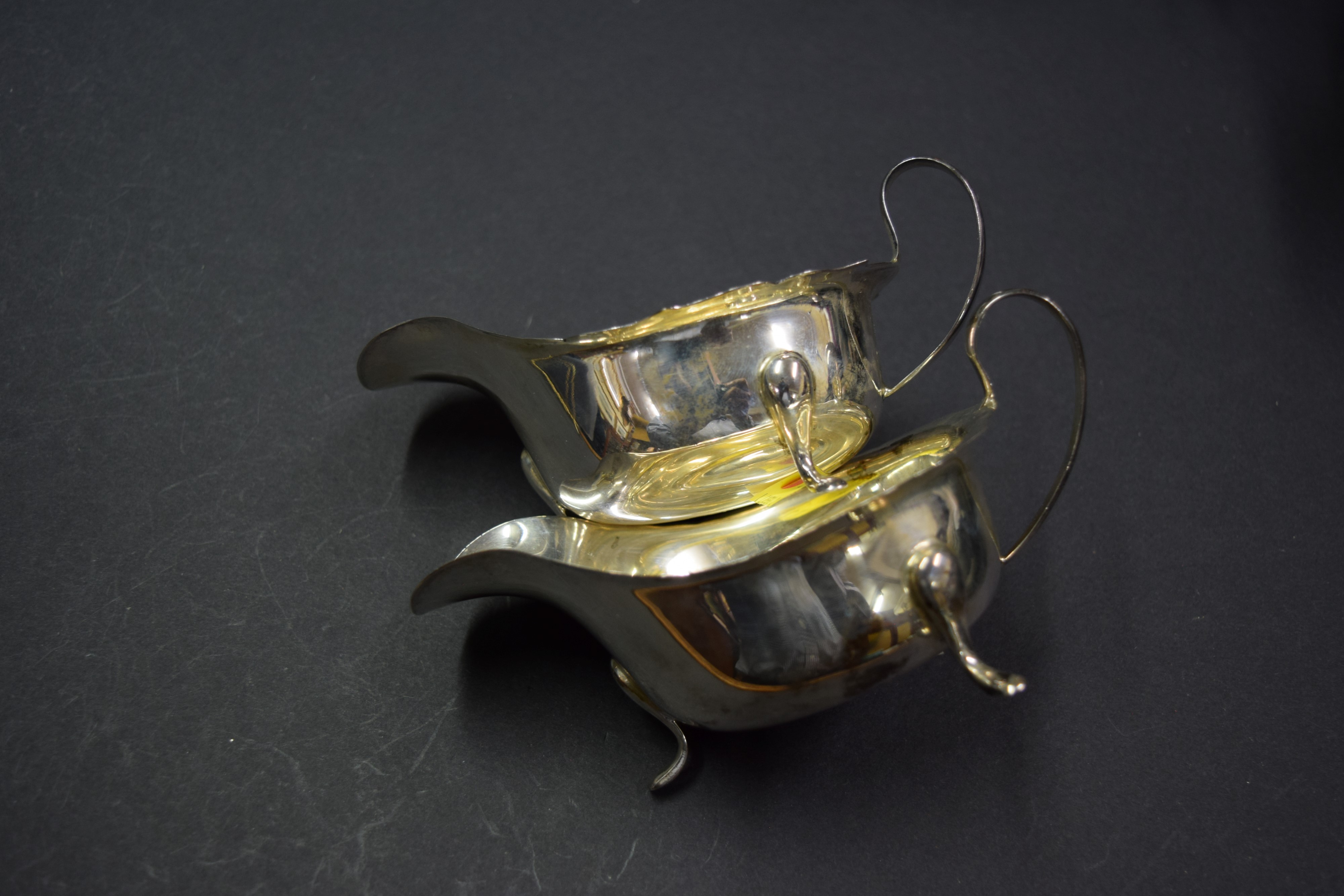 A pair of silver sauce boats, by Viners, Sheffield 1933 and 1934, 219g. - Image 2 of 2