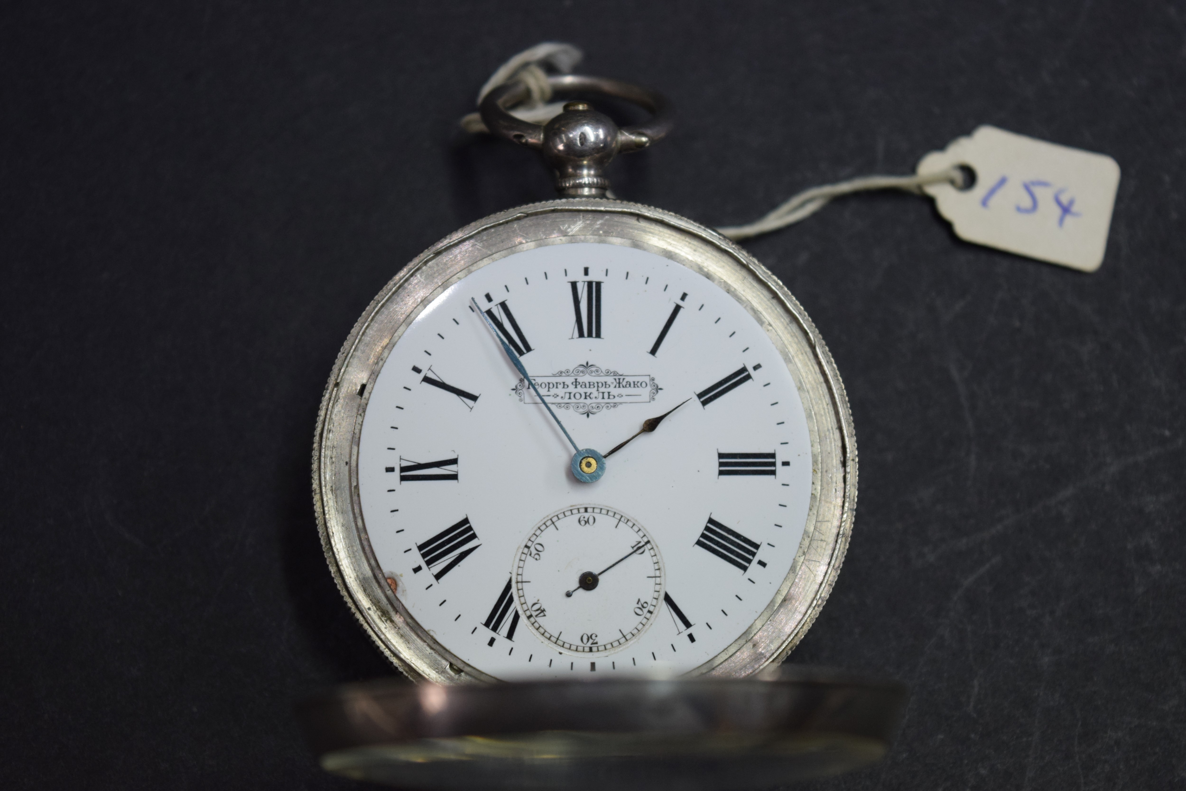 A silver open face pocket watch for the Russian market, having 4.