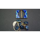 A blue and turquoise enamel buckle,