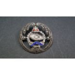 A sterling silver, coloured enamel and marcasite Tank Regiment sweetheart brooch, by T L M, 3cm.