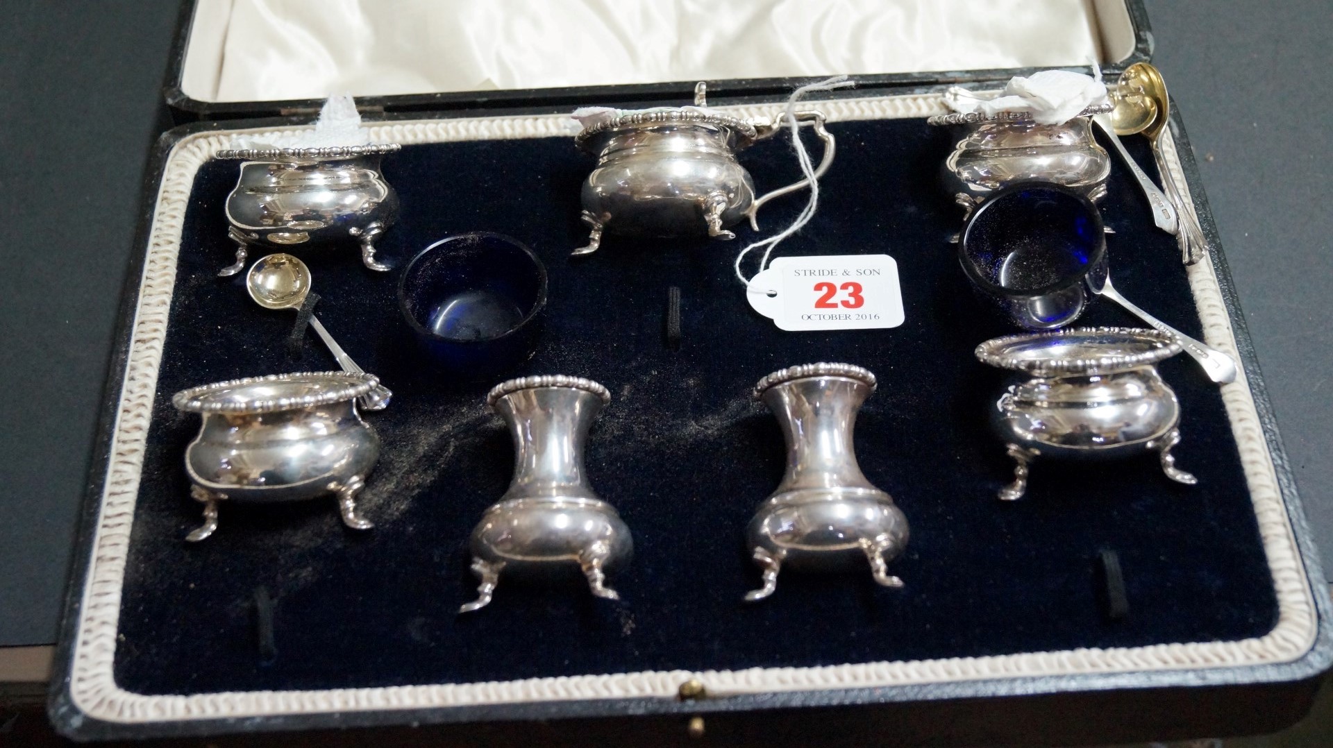 A cased silver seven piece condiment set, by Atkin Bros, Sheffield 1919/1920, 355g.