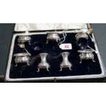 A cased silver seven piece condiment set, by Atkin Bros, Sheffield 1919/1920, 355g.