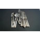 A set of six silver handled fish knives and forks, by William Yates Ltd, Sheffield 1928, having E.P.