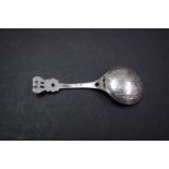 A continental caddy spoon, the bowl formed from a Portuguese 1750 four hundred escudos.