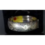 A silver hinged bracelet, by M M, Birmingham 1969, 26g.