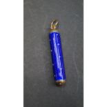 A 9ct gold and enamel telescopic propelling pencil.