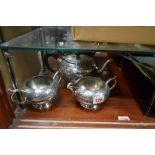 A silver plated three piece teaset.