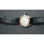 A vintage Tudor ladies manual wind wristwatch, on later leather strap.