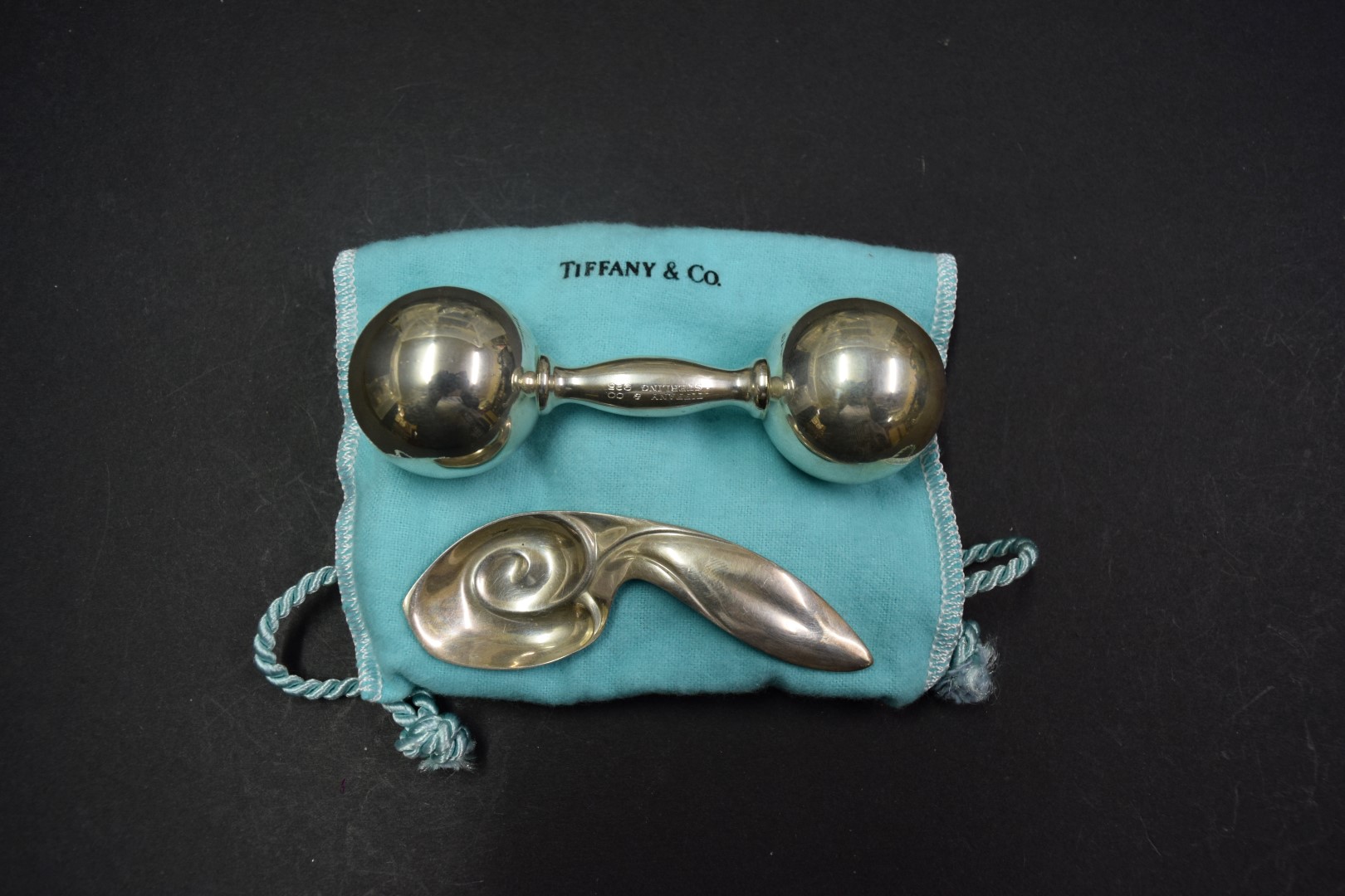 A Tiffany & Co sterling child's bell rattle, 11.