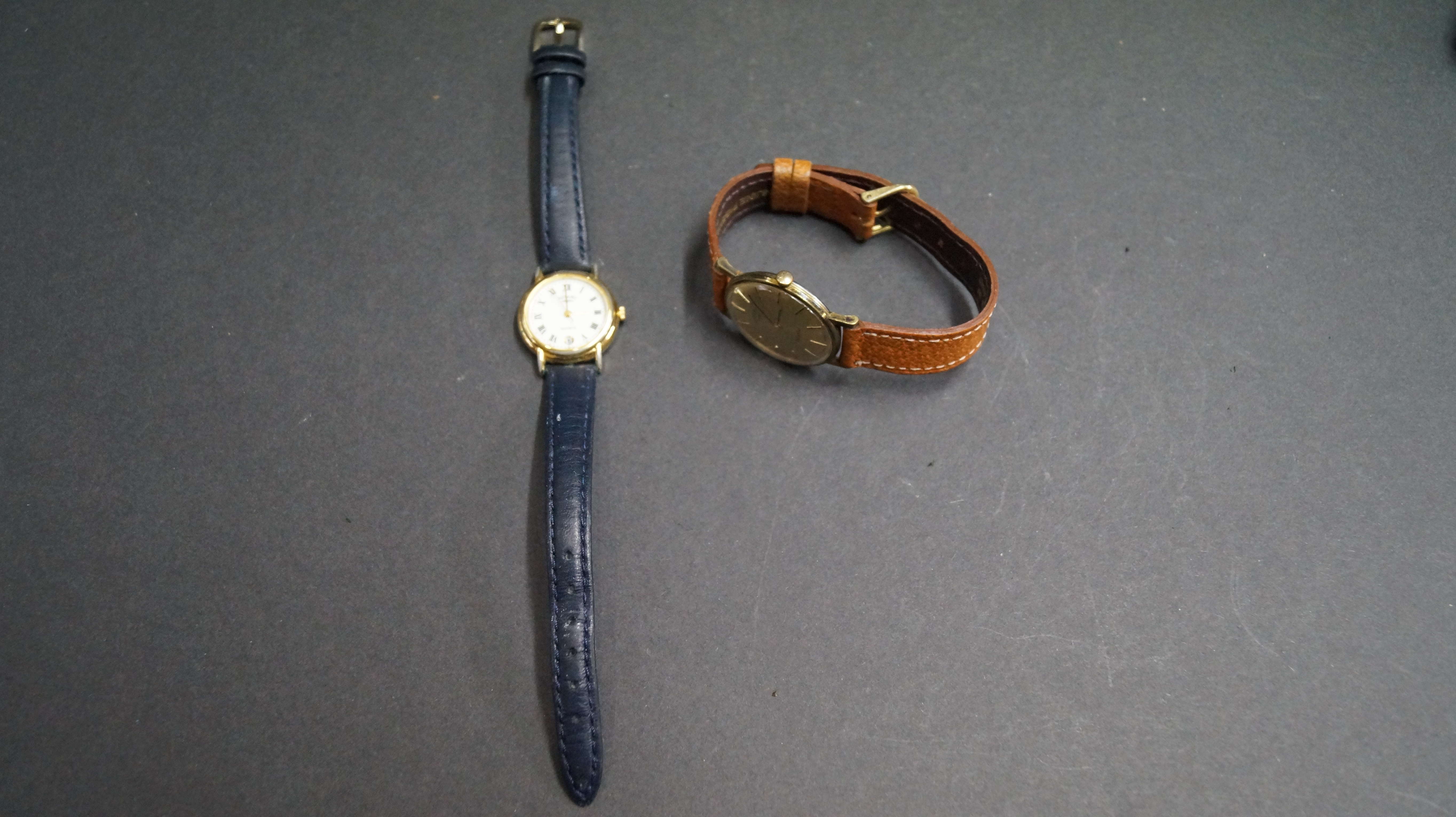 A cased Rotary ladies quartz wristwatch and a vintage Rotary gentleman's wristwatch.