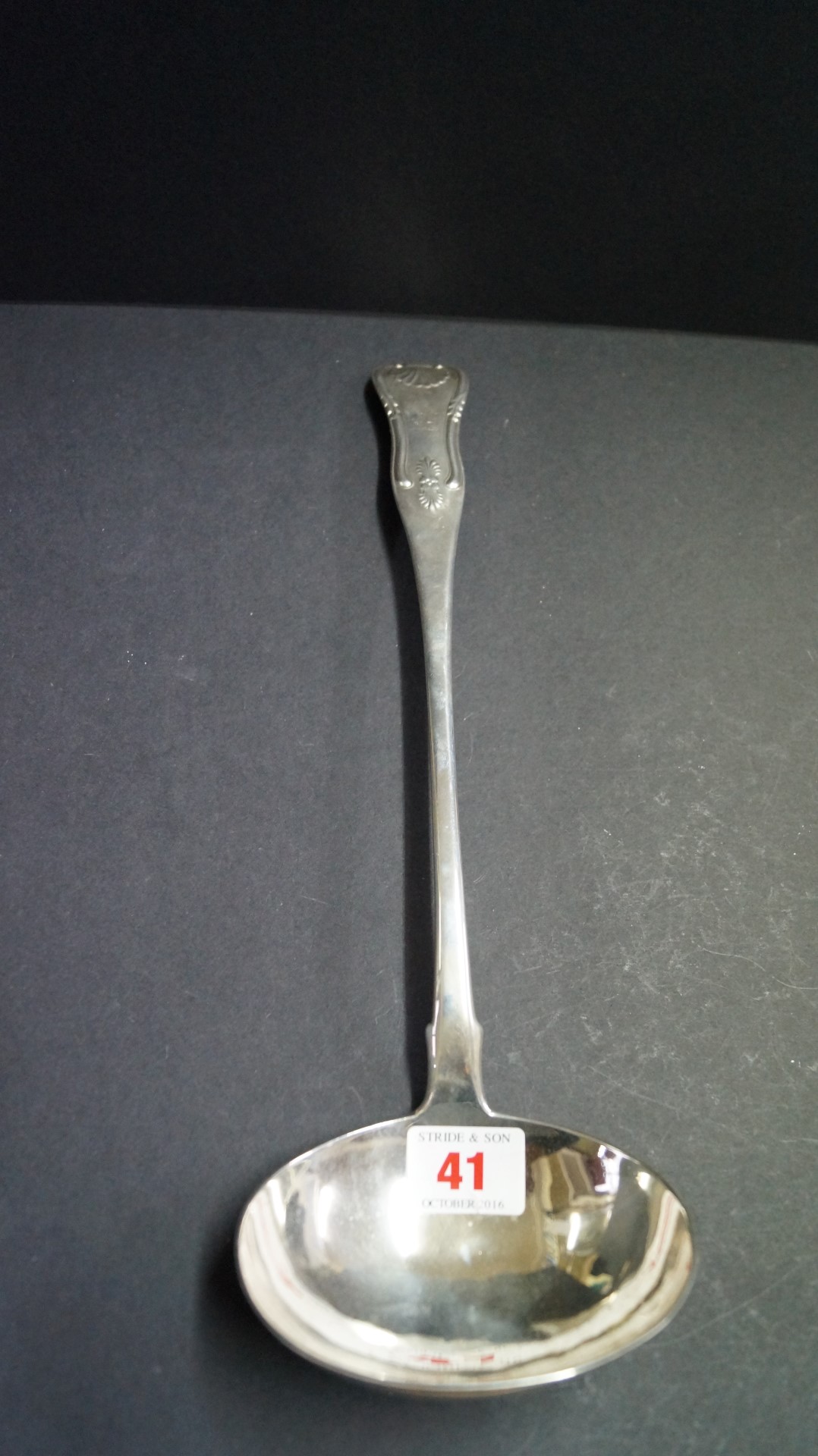 A Scottish George III silver Kings pattern soup ladle, by James & Walter Marshall, Edinburgh,