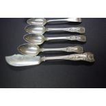 An Irish silver Kings pattern fish knife and seven other items of Irish silver cutlery, 256g.