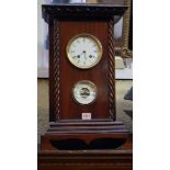 An old mahogany combined clock and barometer, 50.5cm high.
