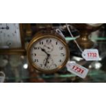 An antique Zenith brass alarm clock, the dial inscribed J W Benson, London',