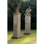 A pair of Bath stone gatepiers surmounted by composition stone eagles 19th century and later 297cm.;