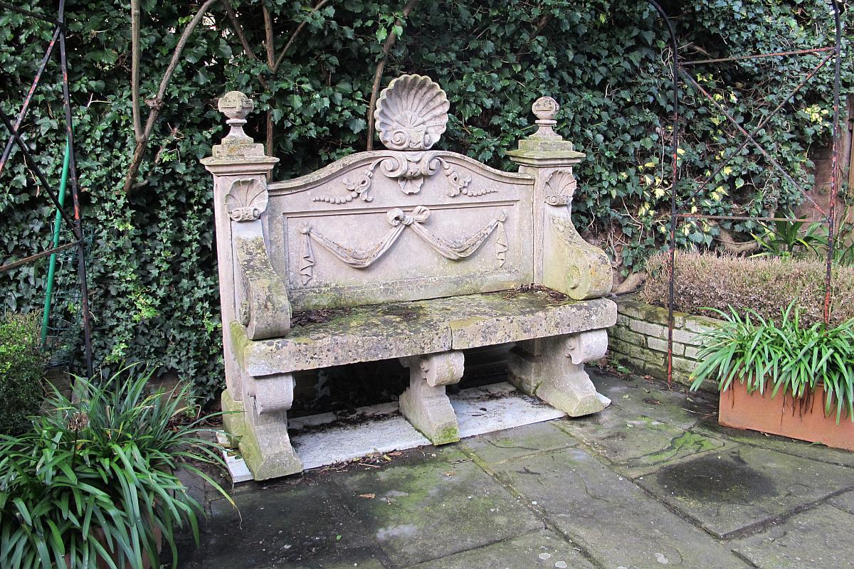 Garden Seat: An Edwardian carved Bathstone seat early 20th century187cm.; 74ins wide