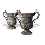 Garden Urns: A pair of lead urns 1st half 18th century52cm.; 20½ins high Provenance: Removed