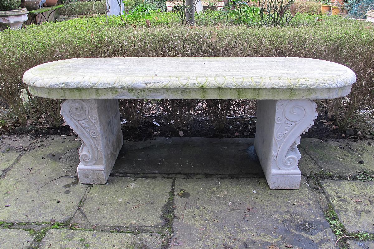 Garden Seat: A carved marble bench 18th century and laterone leg replaced150cm.; 59ins wide