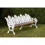 Garden Seat: A rare pair of Macauley and Wade four seasons pattern cast iron seats last quarter 19th