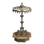 A Coalbrookdale cast iron octagonal stick stand circa 1870 with lift out drip trays 84cm.; 33ins