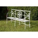 Garden Seat: A Regency reeded wrought iron seat early 19th century restored with later additions