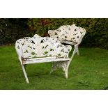 Garden Seat: A pair of Coalbrookdale Fern and Blackberry pattern cast iron seats late 19th/early 20