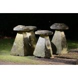 Architectural: An exceptionally large harlequin set of four carved limestone staddlestones the