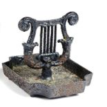 A Kenrick foundry cast iron bootscraper mid 19th century in the form of a Lyre 28cm.; 11ins high A