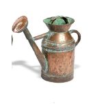 A copper watering can French, circa 1860 with associated rose 48cm.; 19ins high