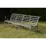 Garden Seat: A wrought iron seat early 20th century 246cm.; 97ins wide