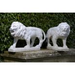 Garden Statues: A pair of carved white marble LionsItalian, late 19th century69cm.; 27ins high by