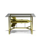 Toys for Boys: A glass topped tablethe frame supporting a AT-3 |Sagger| missile100cm.; 39ins by