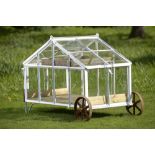 Horticultural: An Edwardian style wrought iron mobile greenhouse modern with brass maker’s plaque