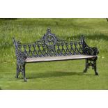 Camden Lock Market: A black painted cast iron seat with wooden slats based on a Coalbrookdale design