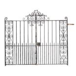 A pair of wrought iron gates early 20th century 276cm.; 116ins wide overall